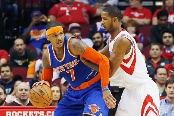 Trevor Ariza of the Houston Rockets defends against Carmelo Anthony